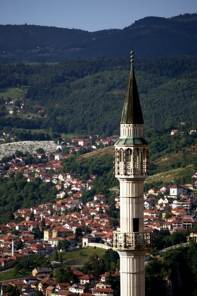 a tall tower with a clock on top of it